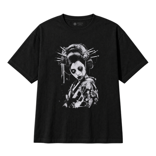A black short-sleeve crewneck t-shirt featuring a high-contrast white graphic print of a geisha with traditional hairpins, makeup and dead eyes, displayed against a solid white background.