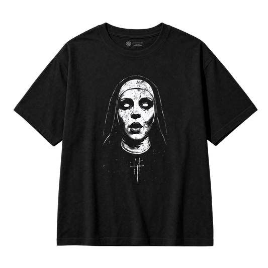 A black short-sleeve crewneck t-shirt featuring a distressed white graphic print of a nun's face with a cross on her chest, displayed flat against a solid white background.