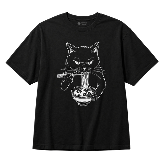 A black short-sleeve crewneck t-shirt featuring a white line art graphic of a cat eating noodles from a bowl with chopsticks.